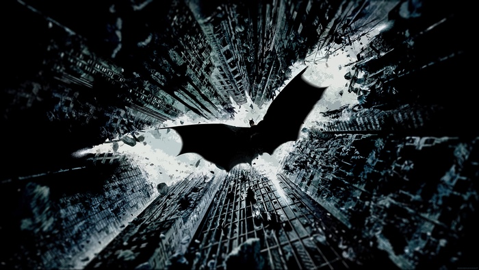 Batman from DC Comics flying over a city