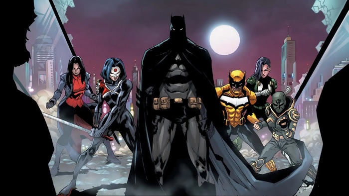 Batman and allies in a city at night