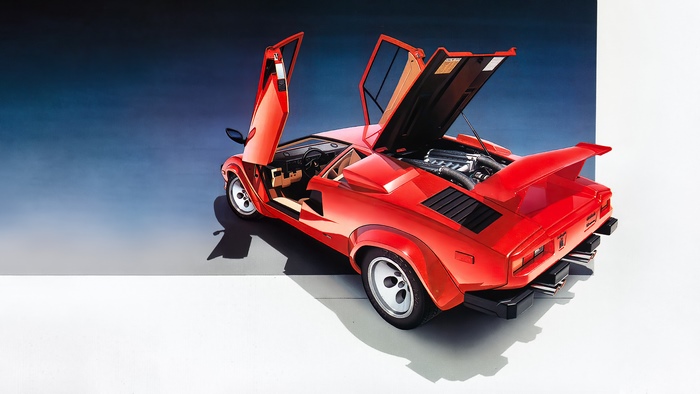Red Lamborghini Countach with Doors and Hood Open