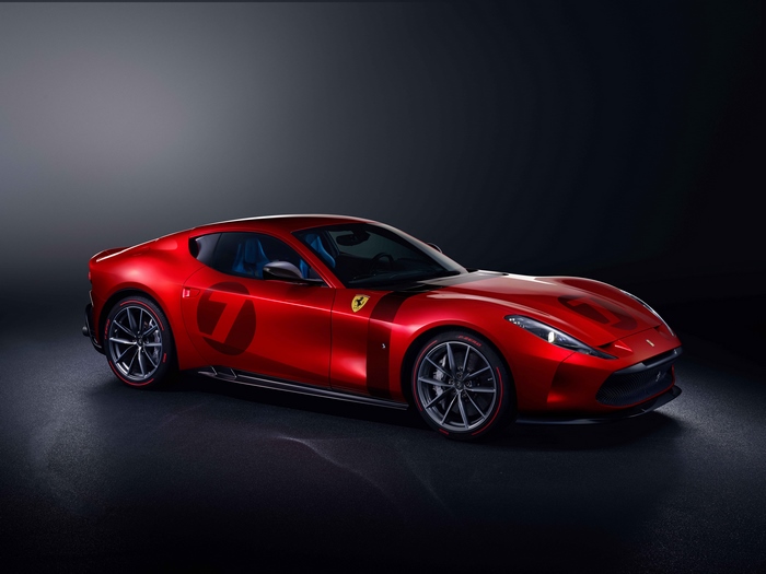 Red Ferrari with number 7 on side