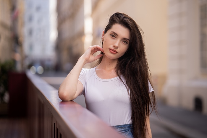 Model in white t-shirt and denim skirt