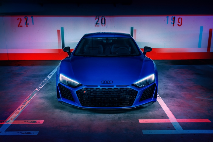Blue Audi R8 parked in a garage