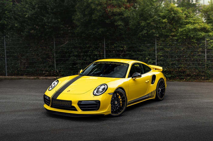 Yellow Porsche 911 with black stripes
