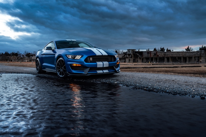 Blue Ford Mustang GT350 with white stripes