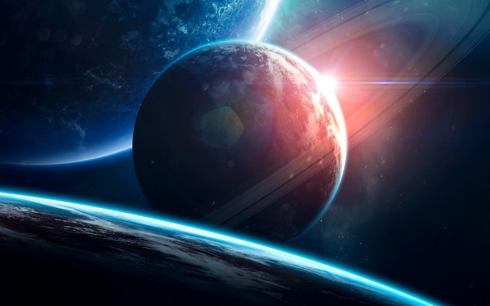 Digital art of planets and rings in space