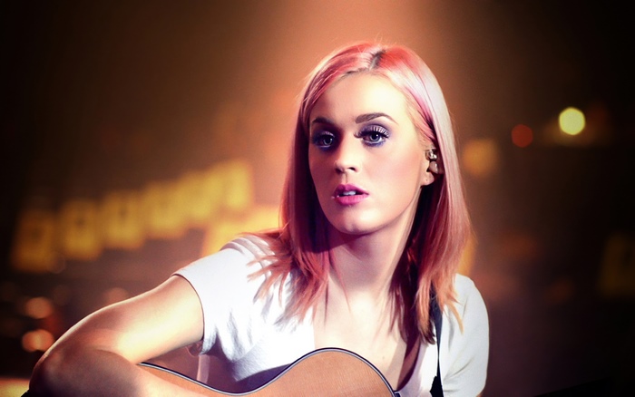 Katy Perry playing guitar