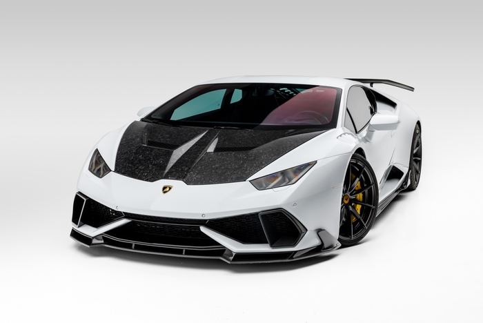 White Lamborghini Huracan with carbon fiber hood