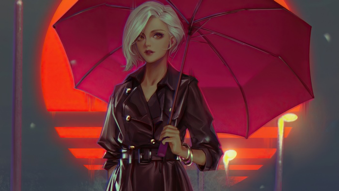 Woman with red umbrella in front of sunset