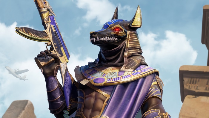 Anubis character from PUBG holding a golden rifle