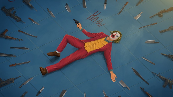 Joker lying on the floor with guns and knives