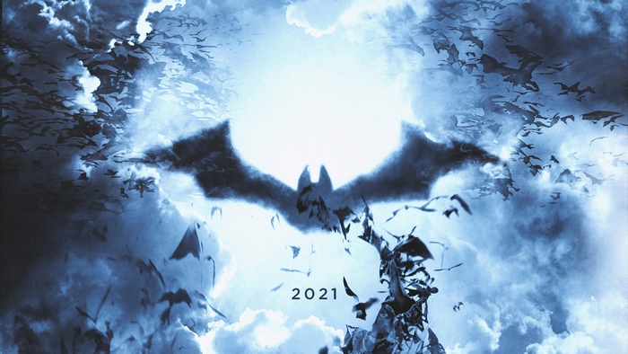 The Batman logo with bats and clouds 2021
