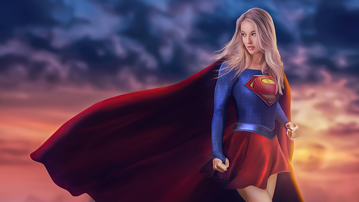 Supergirl artwork with red cape and blue costume