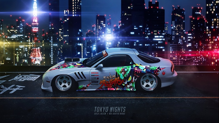 Mazda RX-7 with anime graphics in Tokyo at night