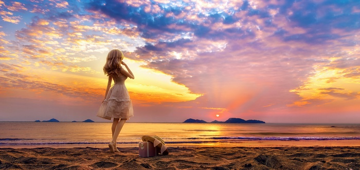 Artwork of a doll on a beach at sunset