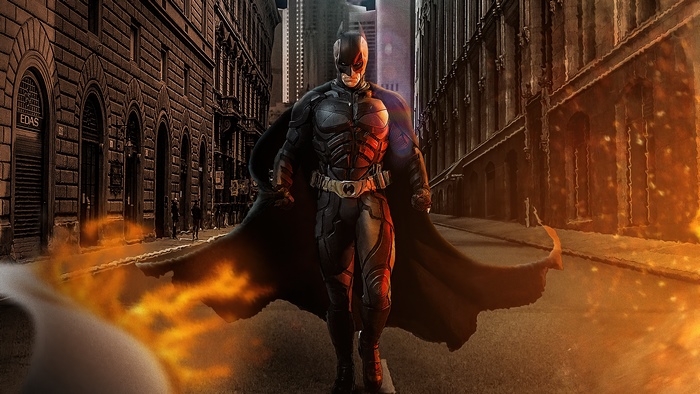 Batman in a burning city street artwork