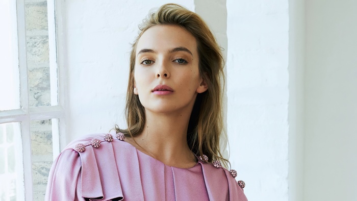 Jodie Comer in a pink dress