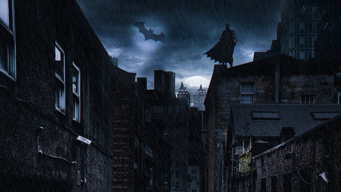Batman on a rooftop in Gotham City during a rainstorm