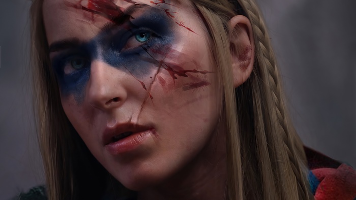 Woman with war paint and blood from Assassin's Creed Valhalla