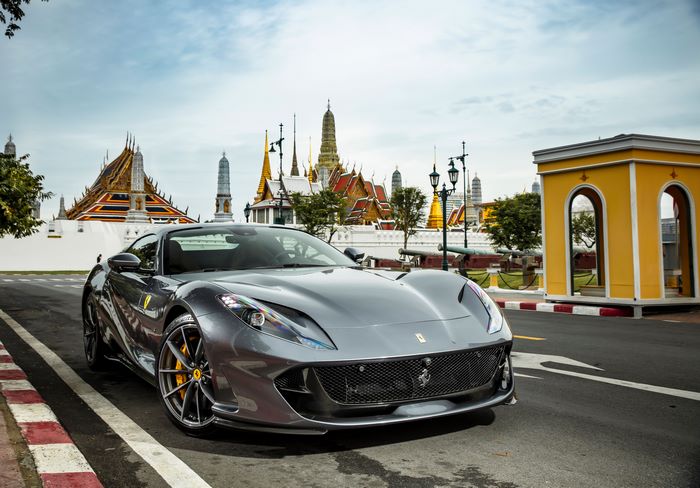 Ferrari 812 Superfast in front of Thai temples