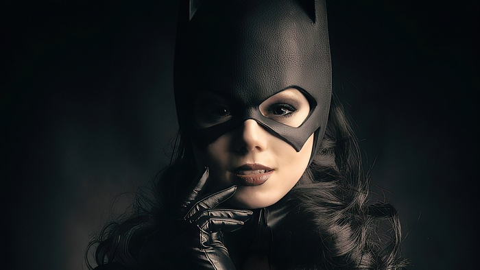 Woman in Batgirl Costume Posing