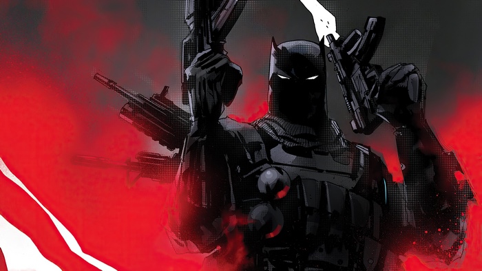 Batman holding guns