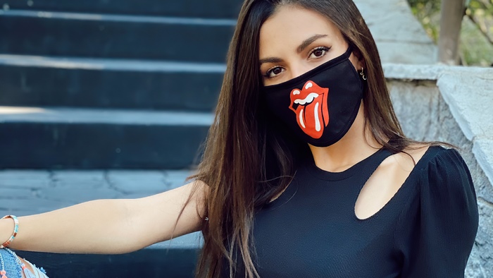 Victoria Justice wearing a Rolling Stones mask