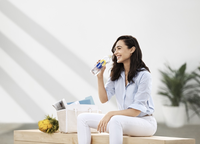 Gal Gadot drinking Smartwater