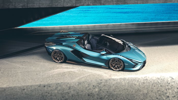 Teal Lamborghini Sian Roadster in a concrete structure