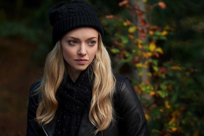 Amanda Seyfried in a black beanie and leather jacket