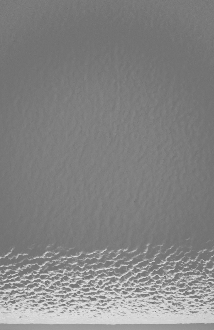Monochrome abstract texture with wavy pattern