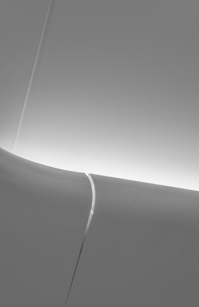 Minimalist abstract white and gray shapes with light