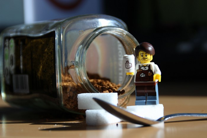 LEGO minifigure with coffee and sugar cubes