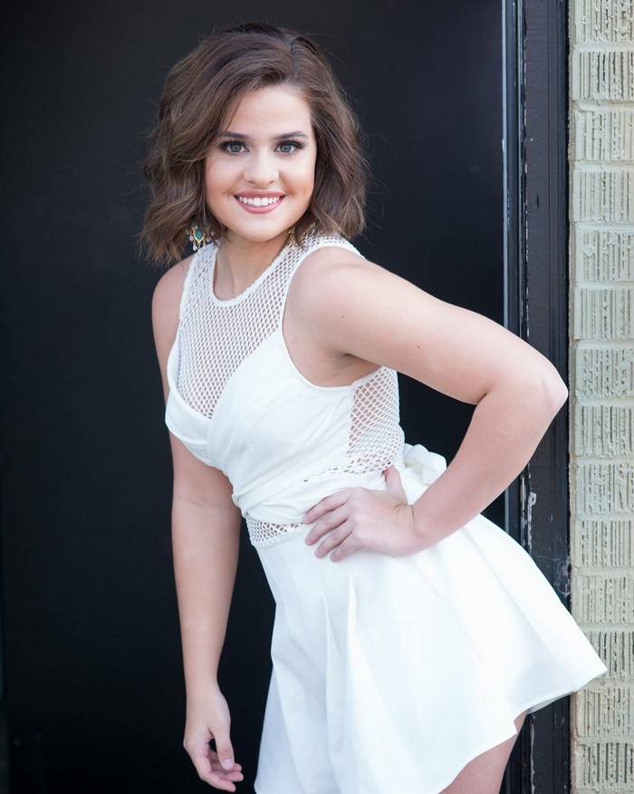 Smiling Woman in White Prom Dress
