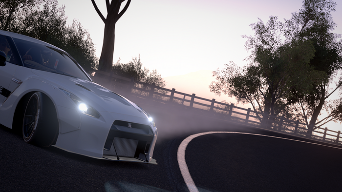 White Nissan GT-R driving on a foggy road