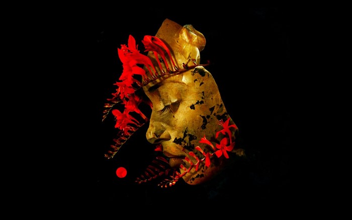 Golden bust with red flowers and a red circle