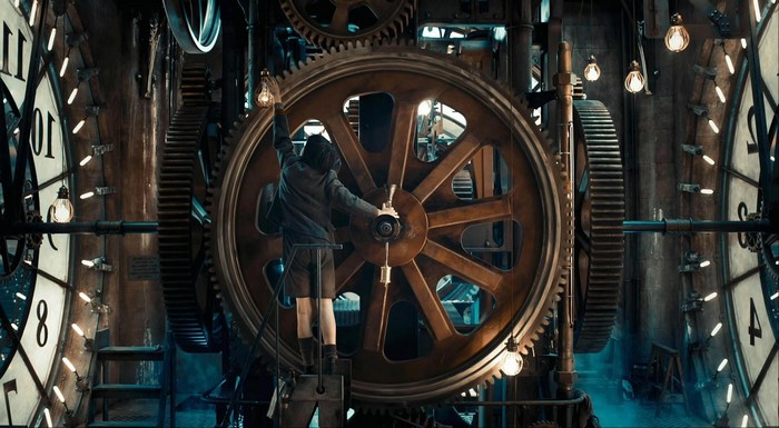 Hugo movie screenshot of a boy in a clockwork mechanism