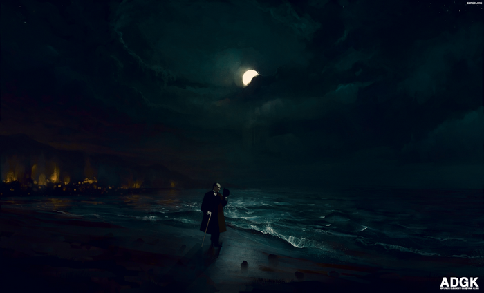 Man on a beach at night with moonlight over the ocean