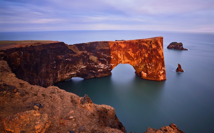 Dyrhólaey arch and sea stacks in Iceland