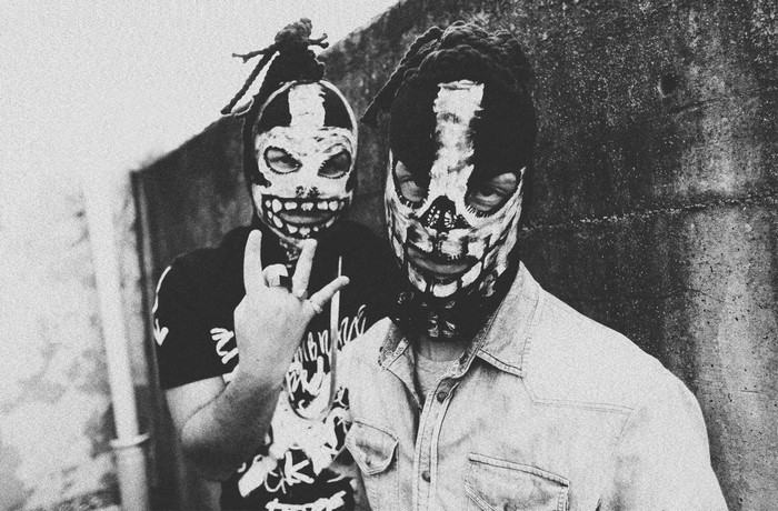 Genetikk duo wearing skull masks