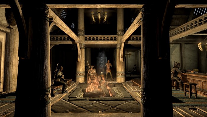 The Elder Scrolls V Skyrim interior with characters and fireplace