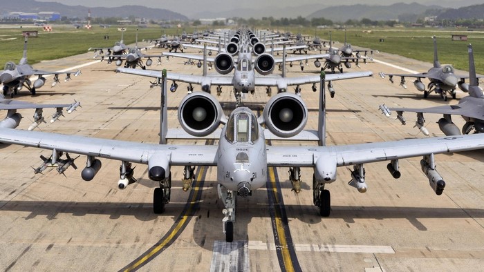 A-10 Thunderbolt II and F-16 Fighting Falcon aircraft on runway