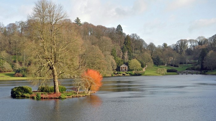Lake with island and trees in autumn