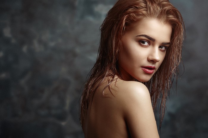 Portrait of Woman with Wet Hair and Soft Lighting