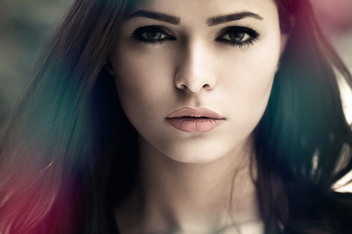 Close-up portrait of a woman with dark hair