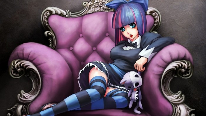 Anime girl with blue and pink hair on a purple chair
