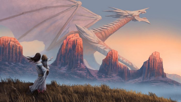 Woman holding child watching a dragon in a canyon