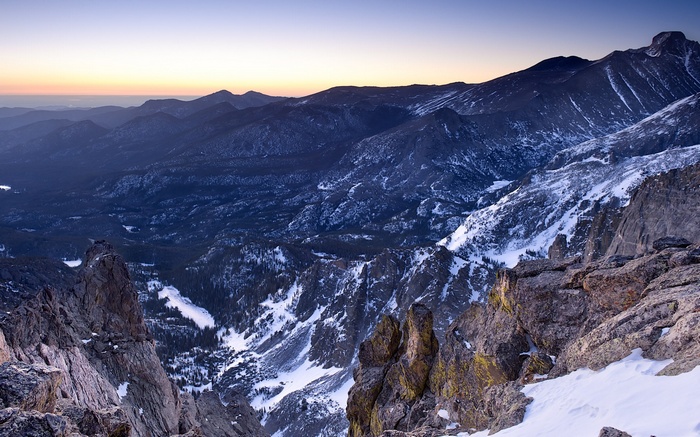 Snow-covered mountains at sunrise