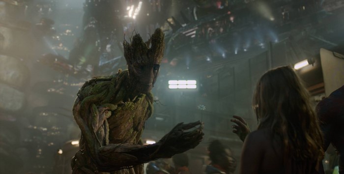 Groot from Guardians of the Galaxy presents a flower