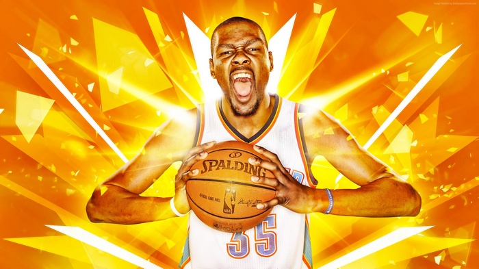 Kevin Durant of the Golden State Warriors holding a Spalding basketball