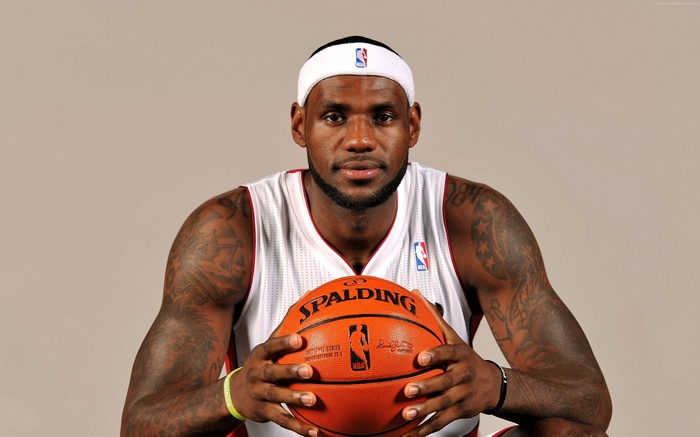 LeBron James from NBA holding a Spalding basketball